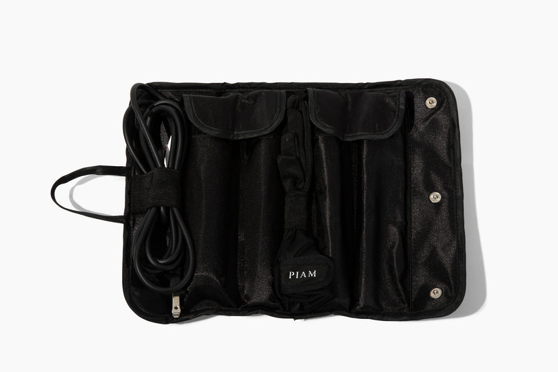 Hair Curler Set Infrared 3X PIAM storage case opened, showcasing compartments and power cord for professional styling tools.